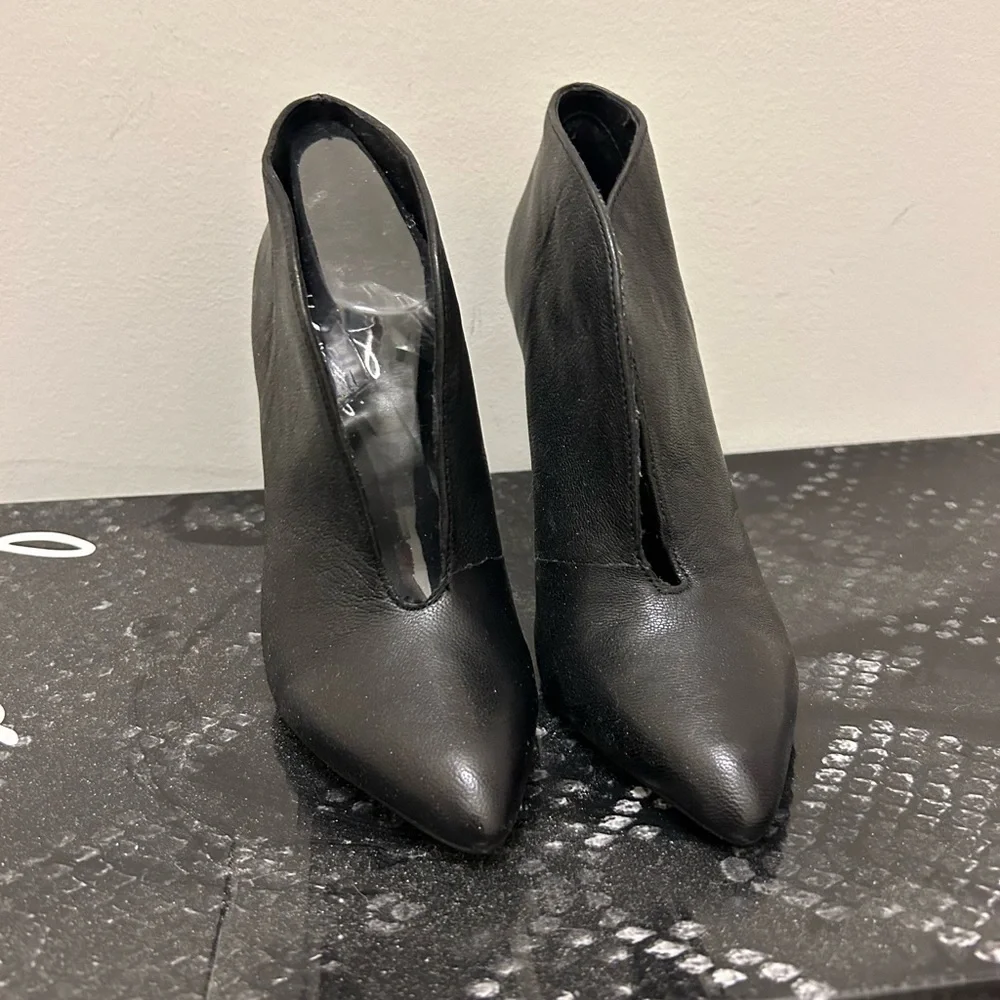 Fergie black booties.